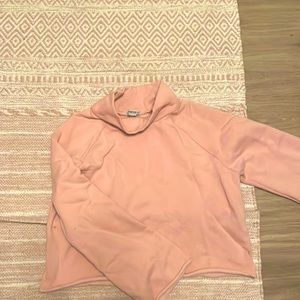 This pink lounge wear sweater great for walking in the fall.
